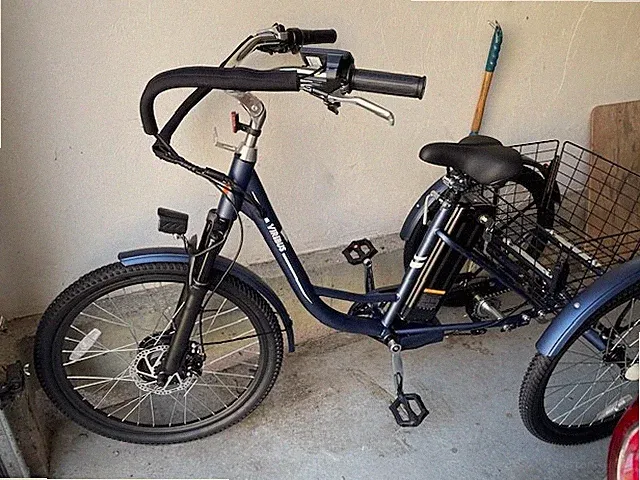 women's tricycle, blue, 24" wheel. Excellent condition. Hardly used.
